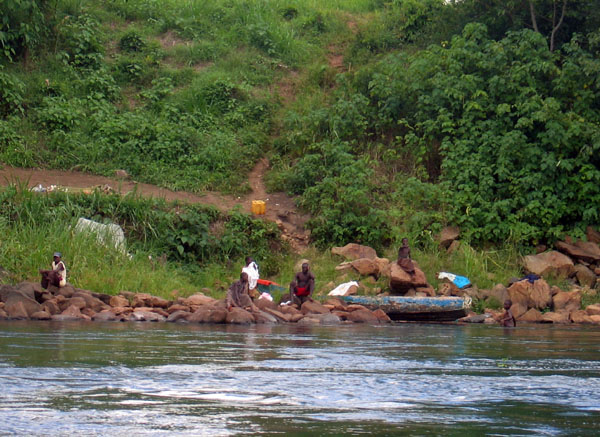 Local people swim, bathe and do their laundry in the Nile
