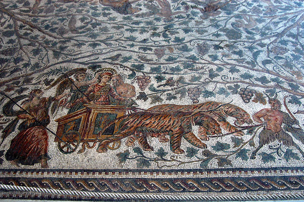 Bacchus, god of wine, riding a chariot pulled by 2 tigers, Thysdrus (El Jem) 3rd C AD