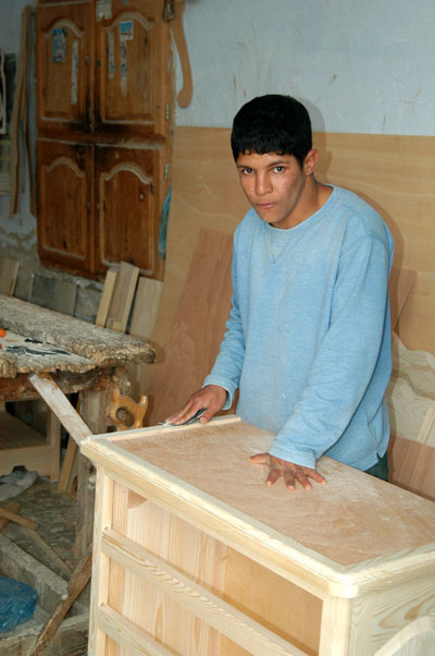 Young cabinet maker at work, Kairouan