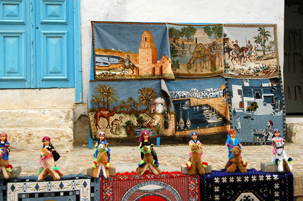 Carpets depicting touristy scenes of Tunisia