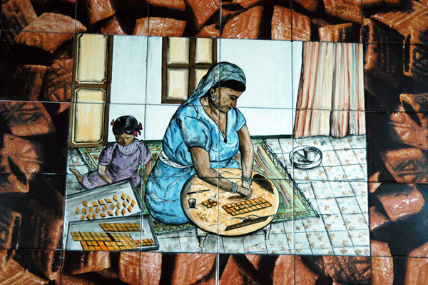 Tiles of a woman making makhroudh, Segni