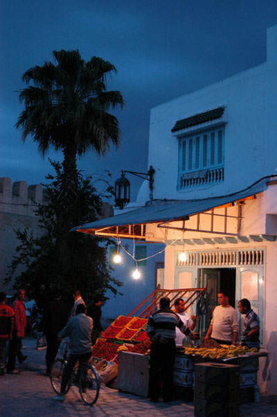 Shop on Place des Martyrs at night, Kairouan