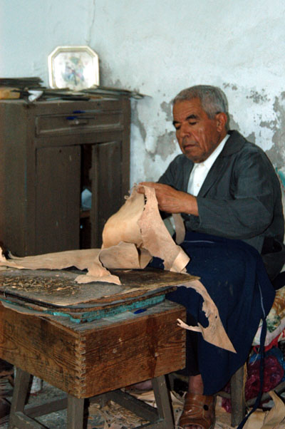 Leather craftsman in his shop, Kairouan