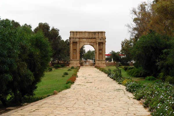 The road to the coast at Sfax leading through the Arch of Diocletian (Arch of the Tetrarchs) 3rd C. AD