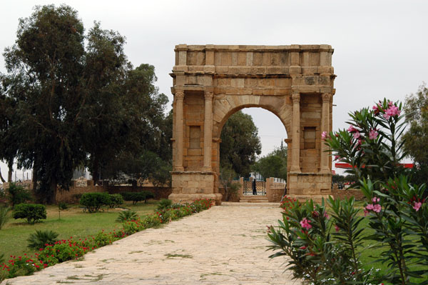 The road to the coast at Sfax leading through the Arch of Diocletian (Arch of the Tetrarchs) 3rd C. AD
