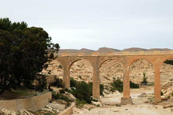 Tunisian railroad crossing a wadi approaching Fériana