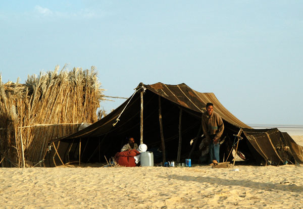 Nomad tent at set up at the camel depot, Dunes de Sable