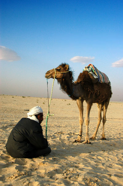 Camel and guide