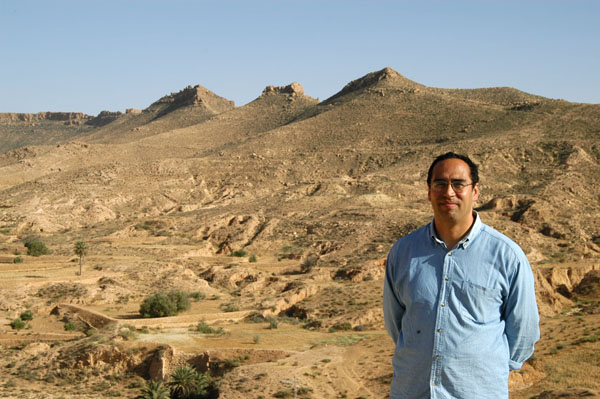Slim with the Dahar Mountains at Ksar Hallouf