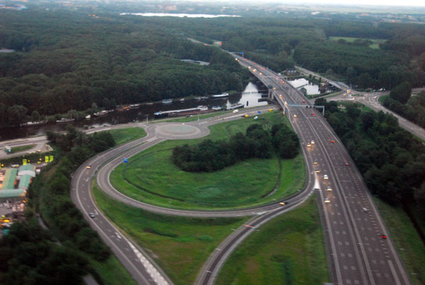 Crossing the motorway on arrival to Schipol Airport, Netherlands