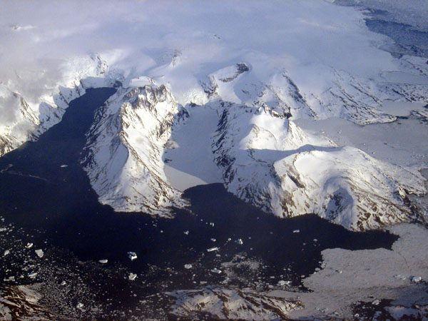 Glaciers flowing down from the Greenland Icecap breaking up into icebergs