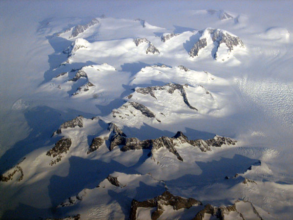 Mountain peaks rising through the Greenland icecap