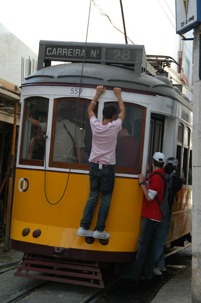 Portugese teen taking a free tram ride