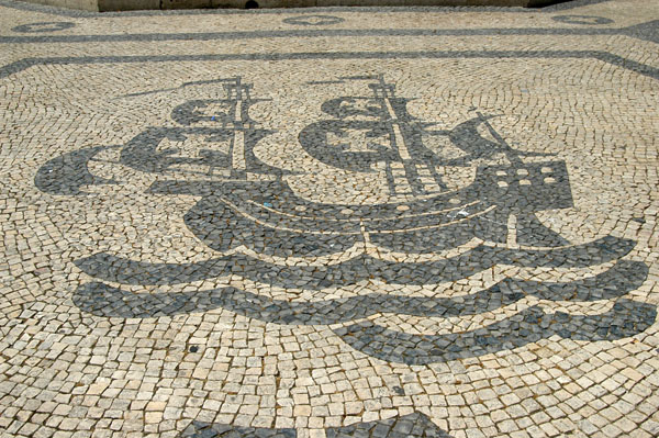 Praa Luis de Cames is covered with Lisbon's typical sidewalk mosaics, here a Portuguese tall ship