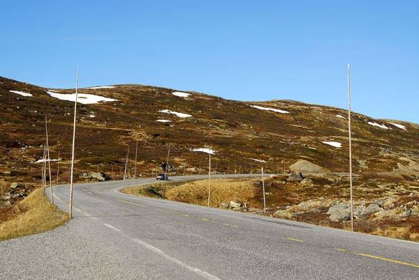 Route 7 through Hardangervidda lined with tall posts to aid the snowplows