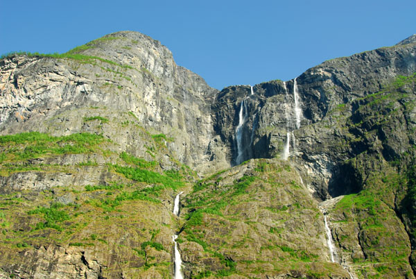 Waterfalls tumbling down the cliffs into Nærøydalen