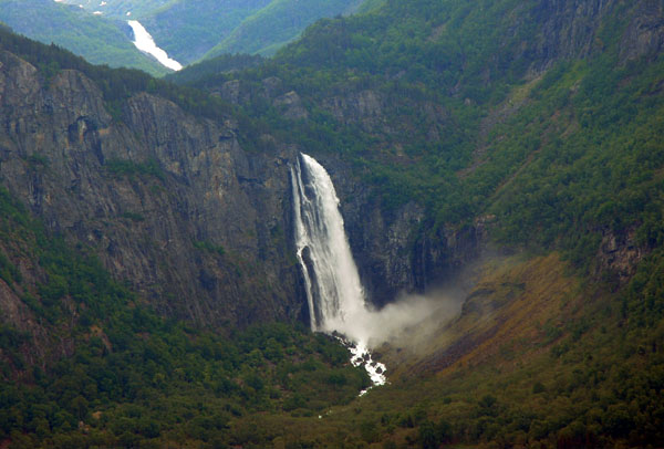 Feigumfossen waterfall with a drop of 218m on the east side of Lustrafjorden
