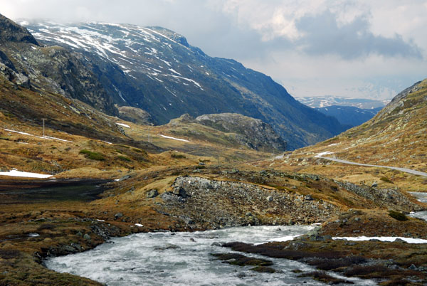Snowmelt fed river flowing down the valley from Jotunheimen