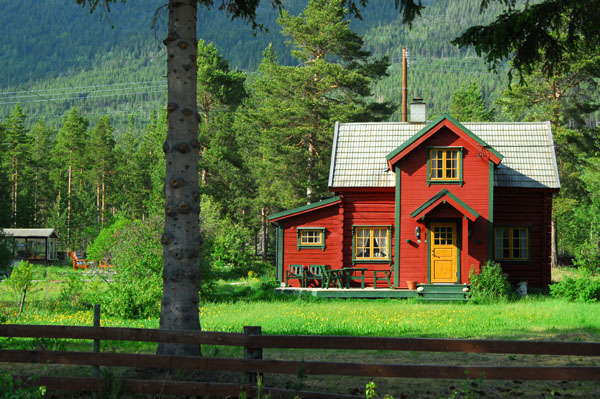 Red painted Norwegian log home near Nordberg, route 15