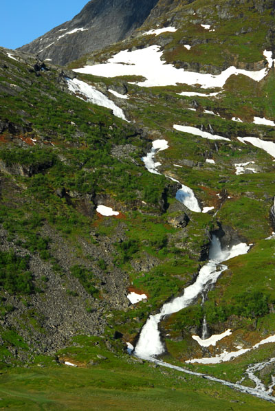 Waterfall in the saddle between Numerous waterfalls on the side of Vinsshornet and Grindalsnibba