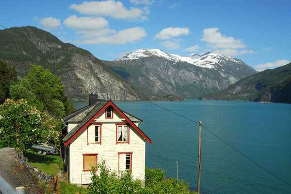 White house on Norddalsfjorden by Valldal