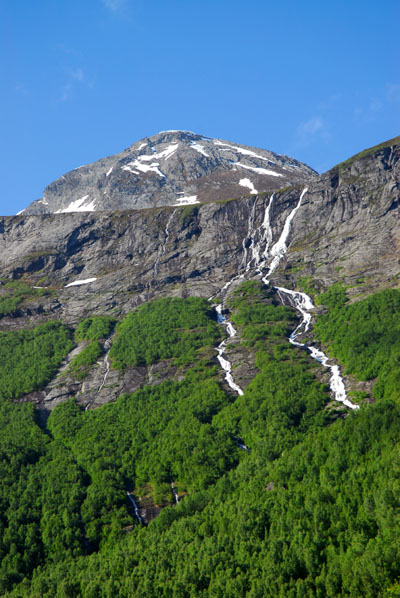 Mountain with cascading waterfalls near Valldal
