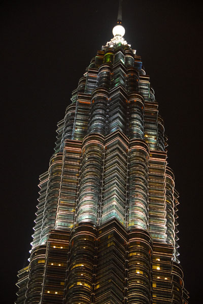 Top of one of the Petronas Towers at night