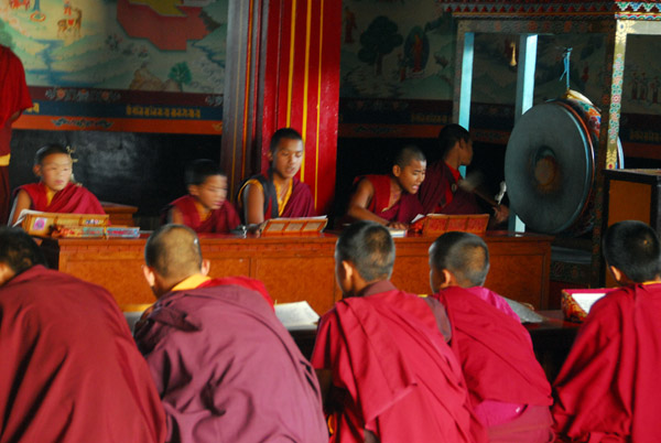 Monks in the main prayer hall making quite a racket