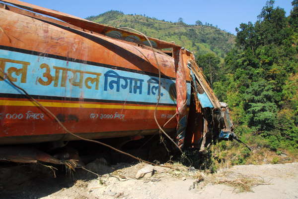A wrecked truck which was pulled back up on the road