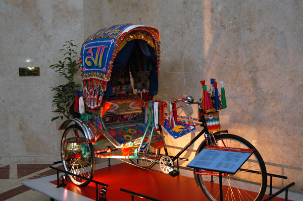 Bangladeshi rickshaw on display in the lobby of the Dhaka Sheraton for those who won't venture outside
