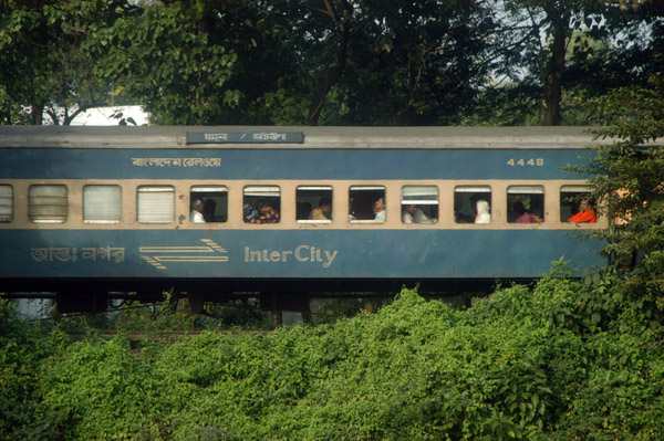 Bangladesh Railway interCity train underway on the edge of Dhaka