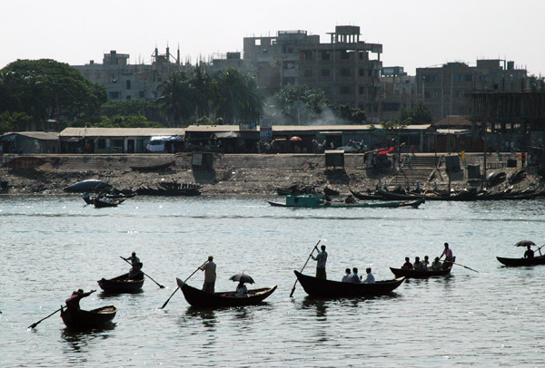 Ferrymen (sampan walas) ply across the Buriganga River in a timeless scene a far cry from the romance of Venetian goldoliers