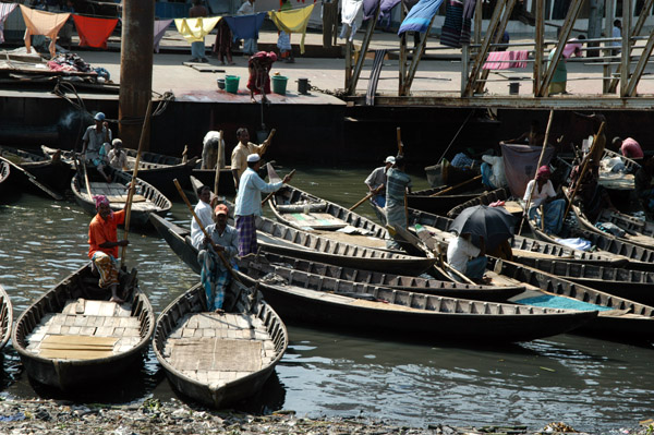 Small wooden sampans lined up waiting to ferry passengers across the Buriganga, Old Dkaha