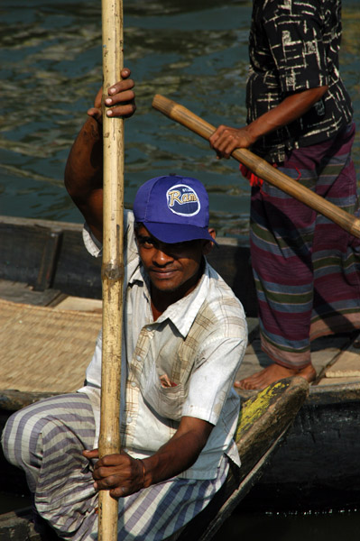 Dhaka sampan wallah...a fan of the St. Louis Rams, Bangladesh