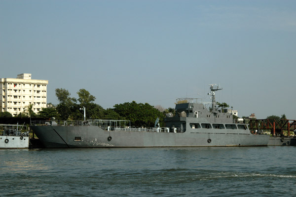 Auxiliary vessel of the Bangladeshi navy at the Shyampur dock just downstream of the Friendship Bridge on the left bank