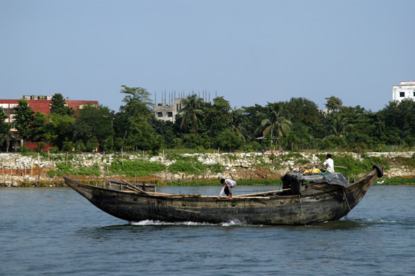 A small motorized dhow-type vessel, Bangladesh