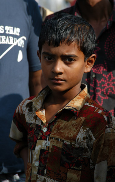 Boy in a nice shirt at the cattle market, Fatulla