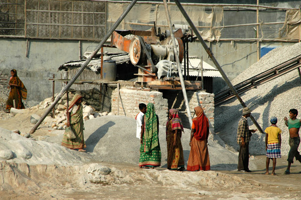 Female laborers at a gravel crusher along the road to Dhaka