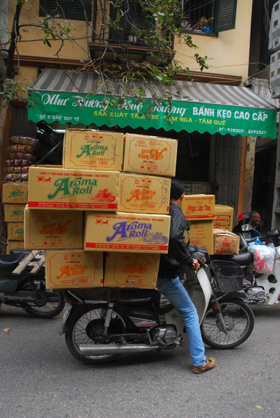 Motorbike overloaded with boxes, Old Hanoi