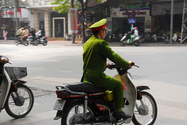 Vietnamese soldier on a motorbike, Hanoi