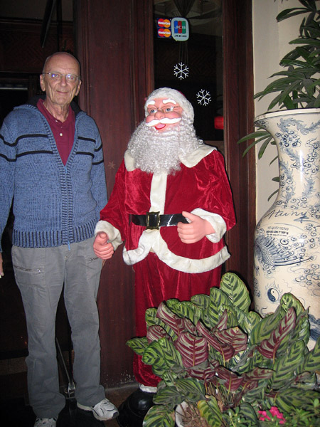 Dad with Santa Claus and his new Vietnamese sweater, Pho Le Thai To, Hanoi