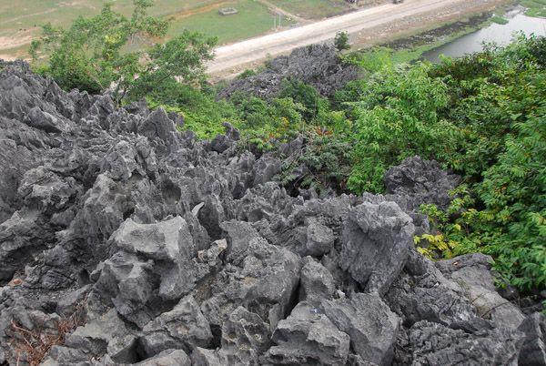 The interesting geological formations around Hoa Lu are volcanic in origin