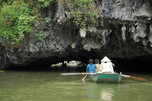 Row boat entering the Second Grotto, Ngo Dong River, Tam Coc