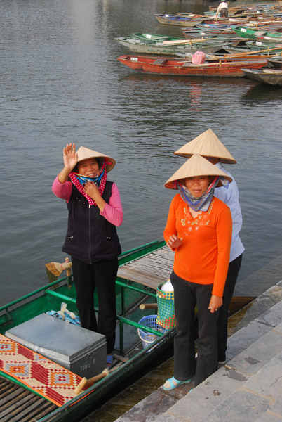 Wave goodbye from our boat lady, Tam Coc