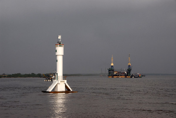 Lighthouse at the confluence of the Cam River and the larger Bach Dang River shortly prior to emptying into the Gulf of Tonkin