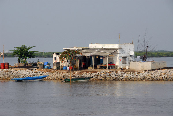 Fishermen's hut on a breakwater along the Bach Dang River near Haiphong