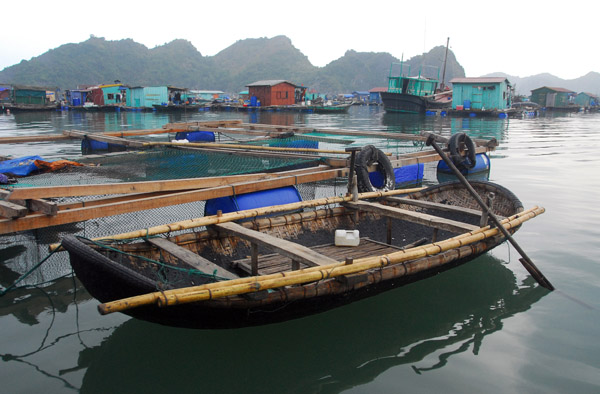One of the traditional woven row boats, Cat Ba floating village