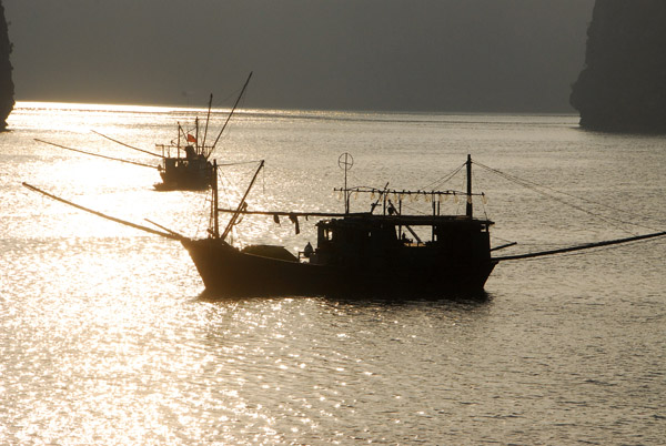 Fishing boats, silhouette, Halong Bay