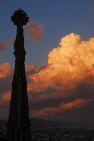 Clouds at sunset with a Sagrada Famlia spire