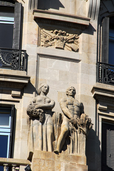 Sculpture group on the faade of Edificio La Unin y el Fnix